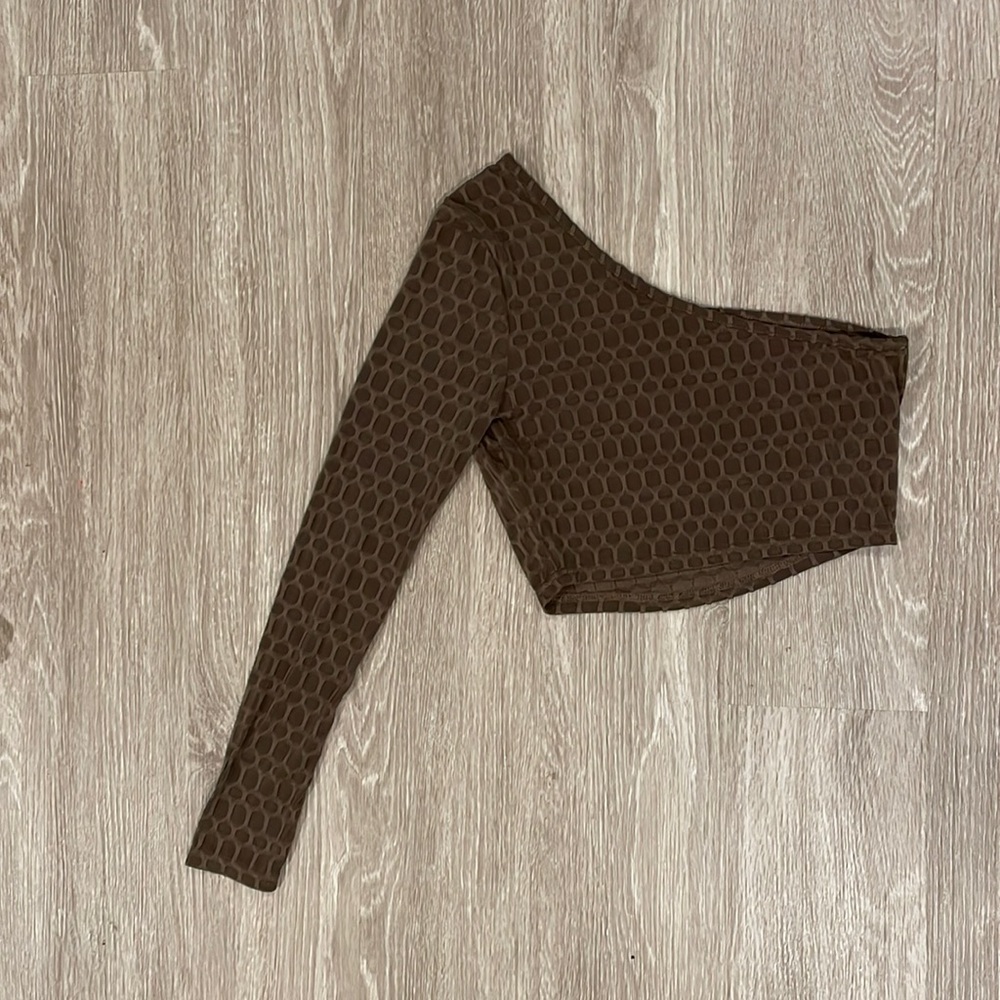 Cropped one sleeve brown shirt. Tight fit. Never been worn. Shein.
